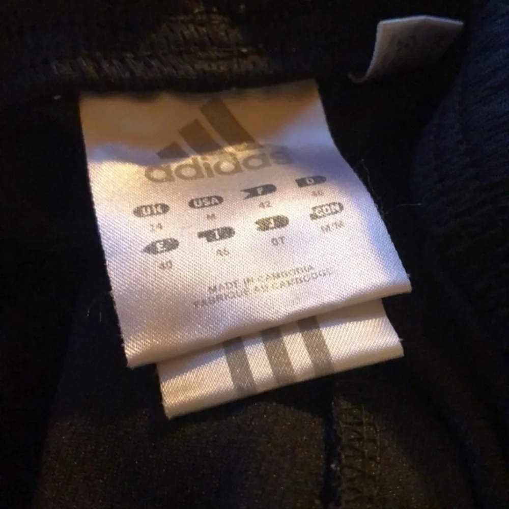 Nike dri-fit black side zipper pocket mesh side panel sz lg